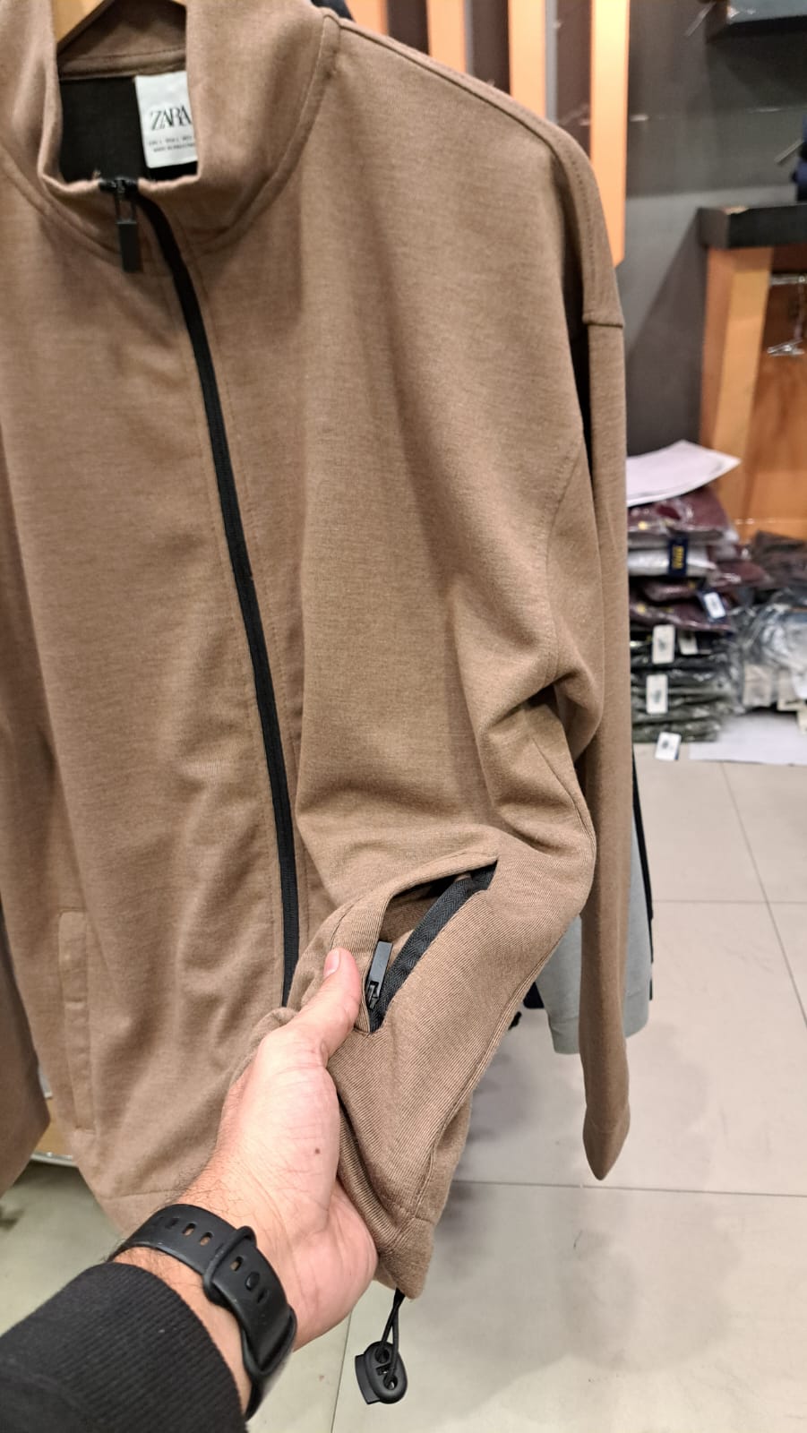 TRACK ZIPPER WITH ZIP UP POCKETS