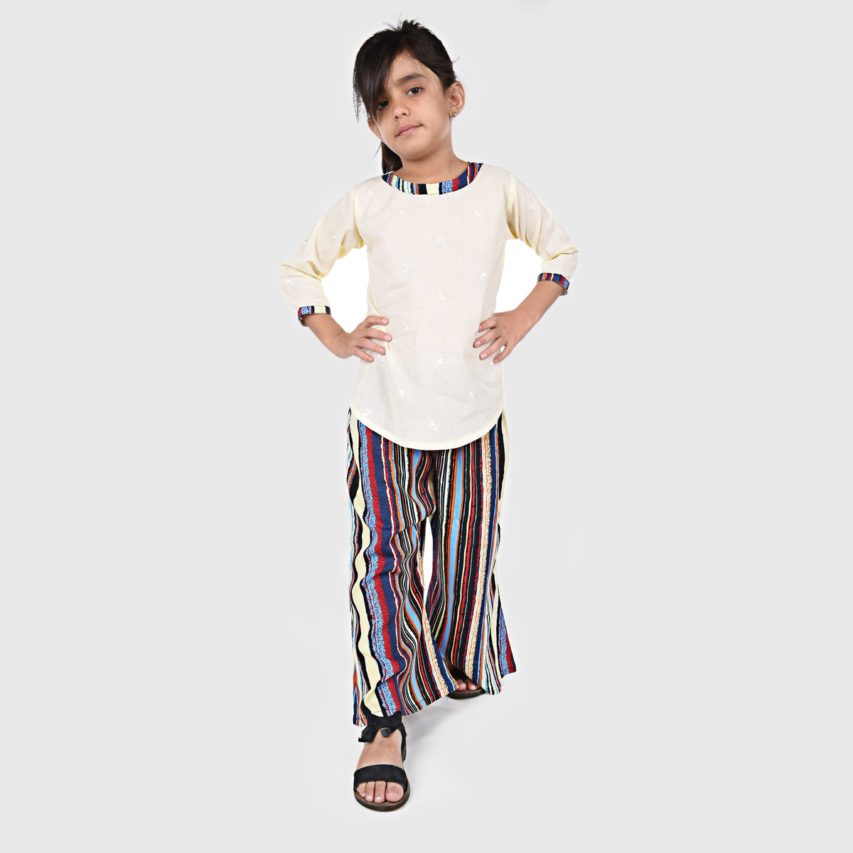 STRIPED HUES LINEN FLARED TROUSER